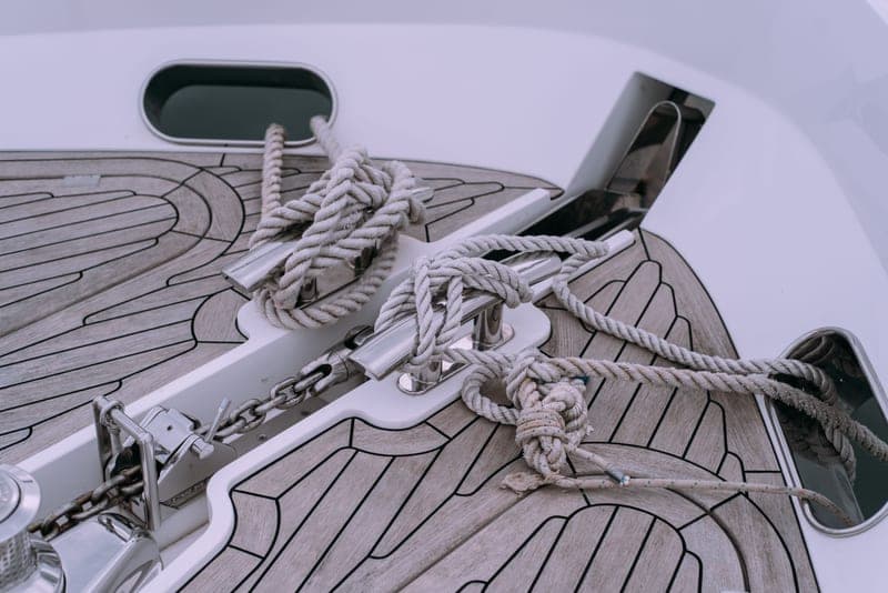 Anchor rope coiled on the deck of a boat