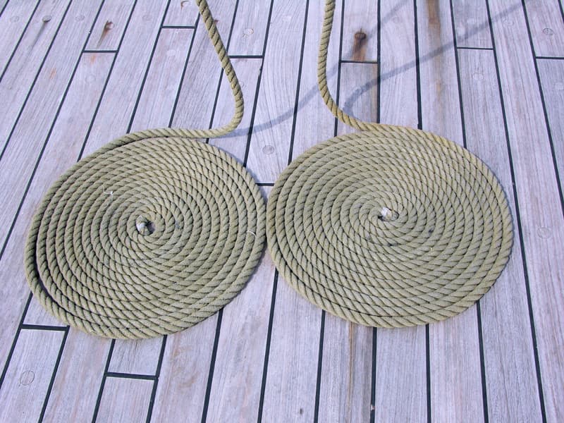 A coiled rope on a boat deck