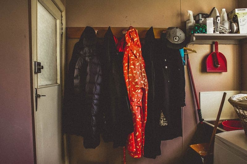 Life jackets hanging on a rack